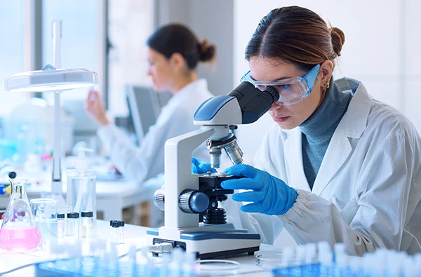 What is a clinical trial- clinical trial information for participants- doctor observing a sample through a microscope